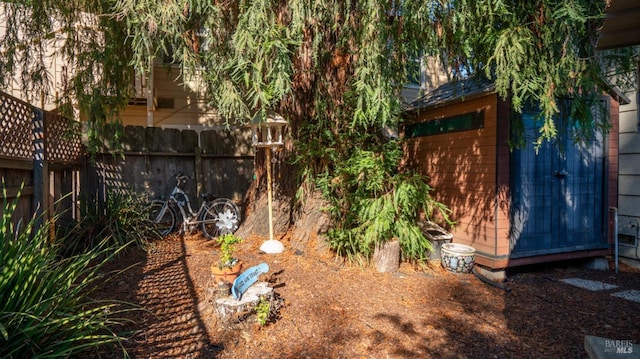 705 Tupper St, Santa Rosa, CA 95404 - view of yard with fence and an outdoor structure