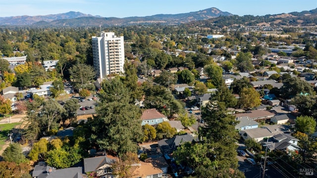 birds eye view of property featuring a mountain view