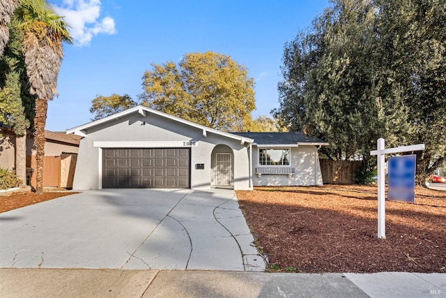 single story home with a garage