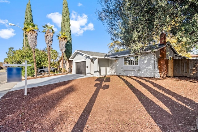 single story home with a garage