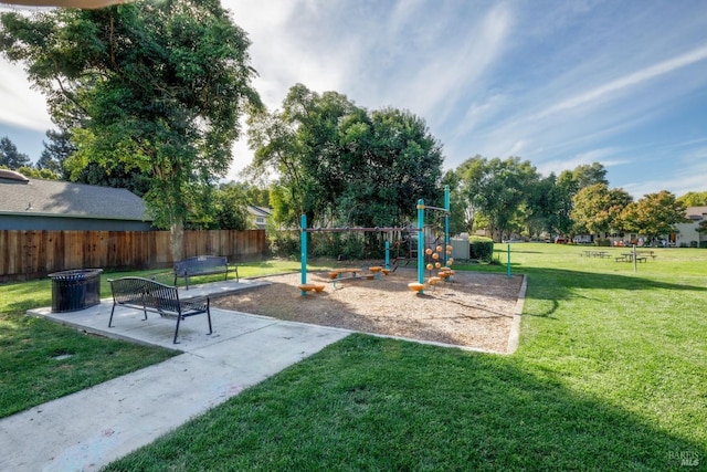 view of playground featuring a lawn