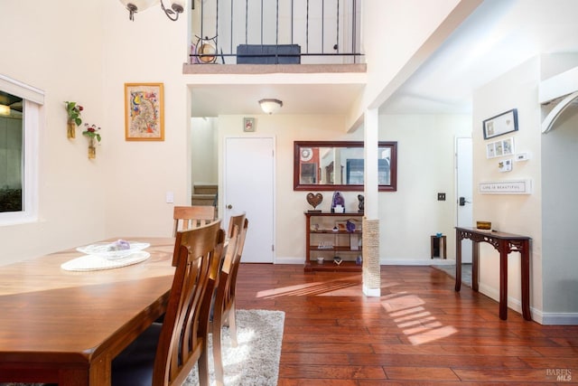 dining room featuring dark hardwood / wood-style flooring