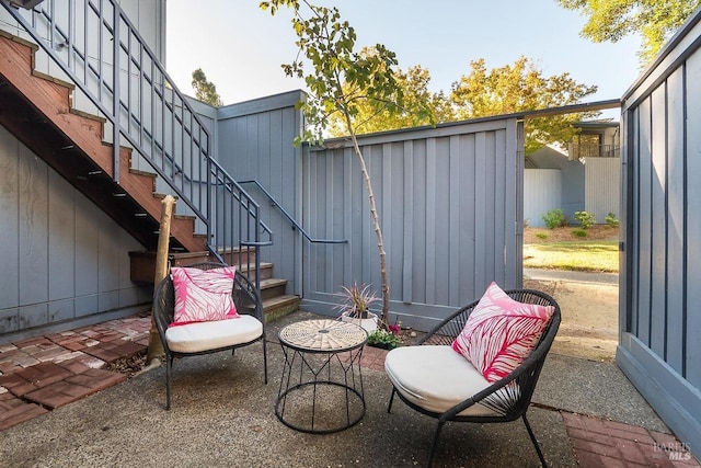 view of patio featuring stairway
