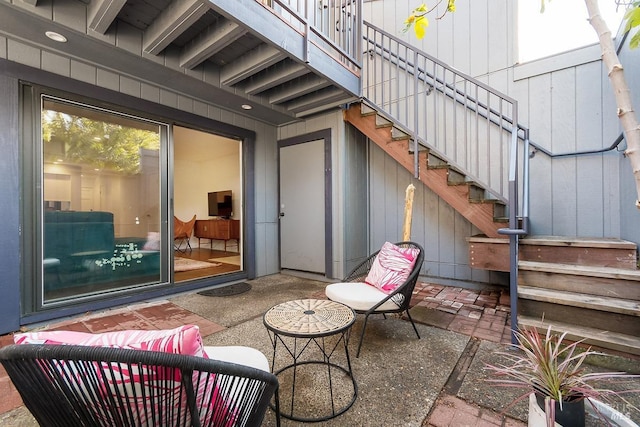 view of patio / terrace featuring stairway