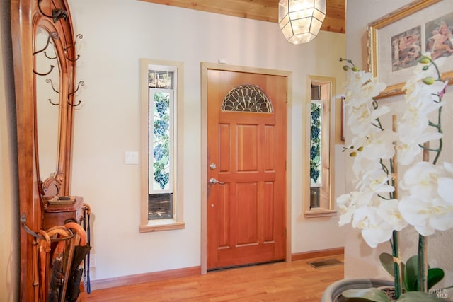 foyer with light hardwood / wood-style flooring