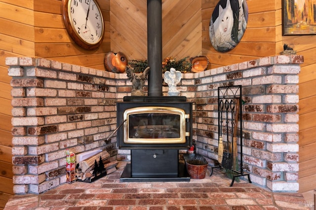 details with wood walls and a wood stove