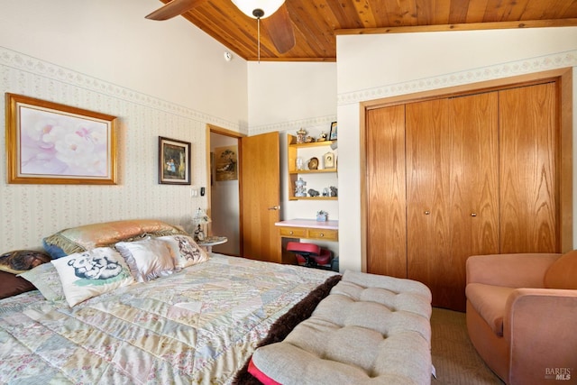 bedroom featuring a closet, wooden ceiling, vaulted ceiling, and carpet floors