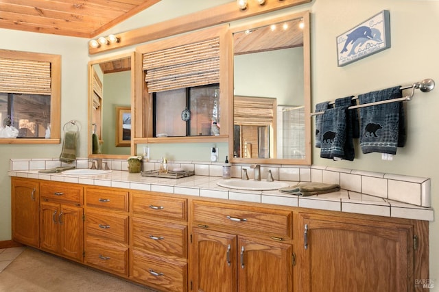 bathroom featuring vanity, tile patterned floors, wooden ceiling, and vaulted ceiling