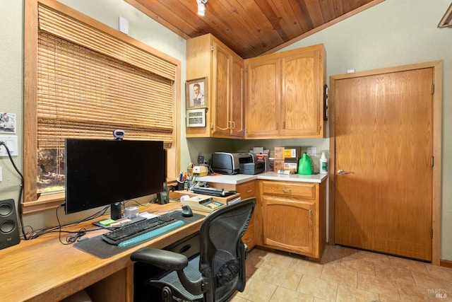 office space with built in desk, wood ceiling, and lofted ceiling