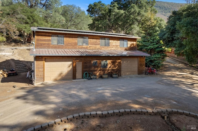 garage featuring a mountain view