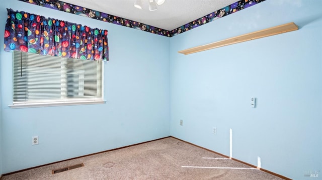 view of carpeted spare room