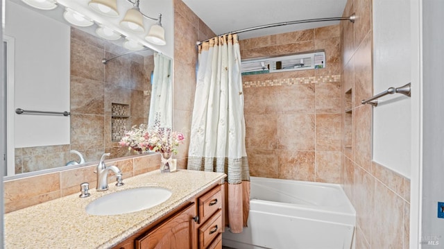 bathroom with vanity and shower / bath combo