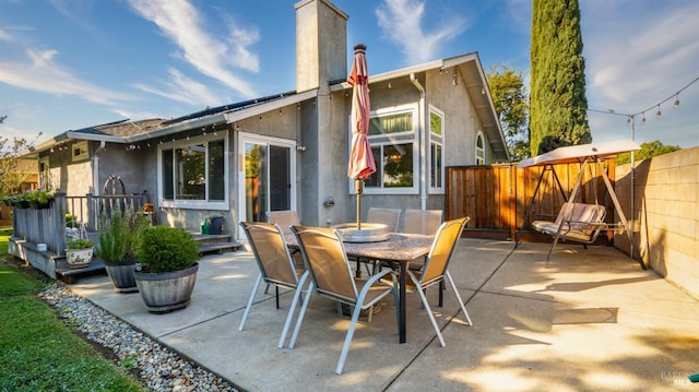 back of house featuring a patio area