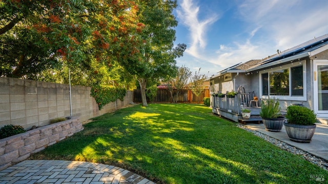 view of yard featuring a deck