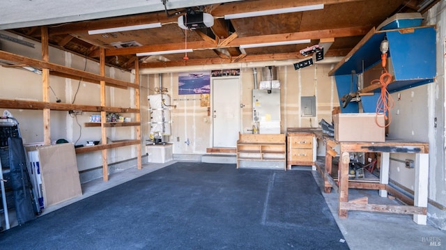 garage with a garage door opener and electric panel