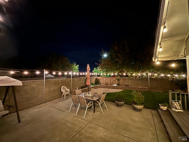 view of patio at night