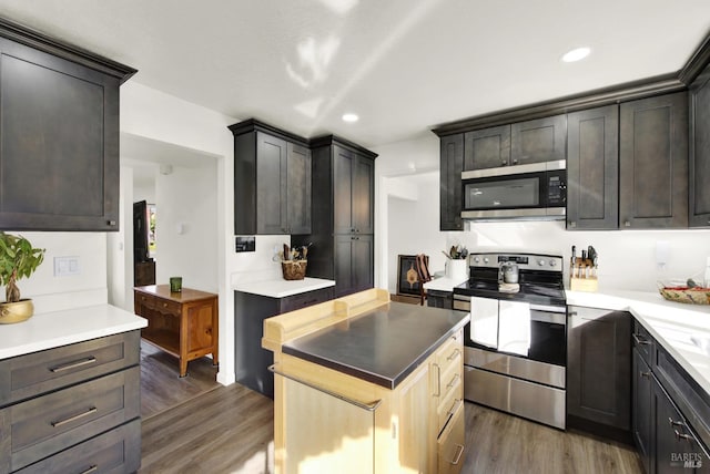 dining area with hardwood / wood-style flooring and a chandelier