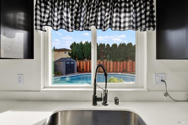 kitchen featuring appliances with stainless steel finishes, dark hardwood / wood-style flooring, and sink