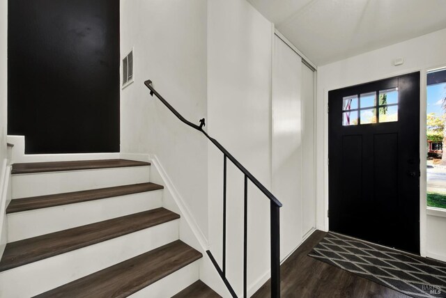 dining space featuring dark hardwood / wood-style floors