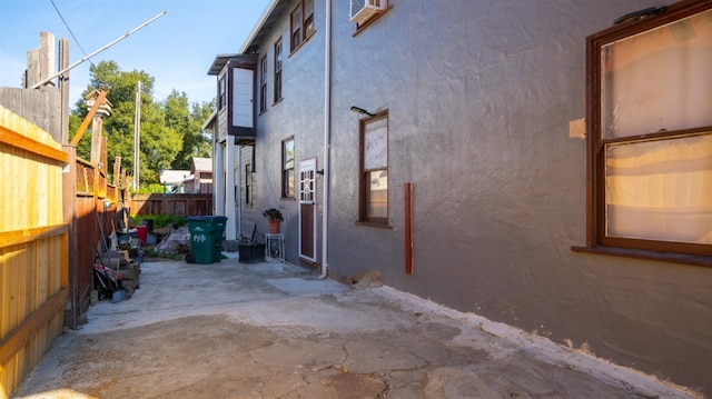 14090 Winnie St, Walnut Grove, CA 95690 - view of home's exterior with a patio and stucco siding