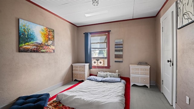 bedroom featuring hardwood / wood-style flooring and ornamental molding