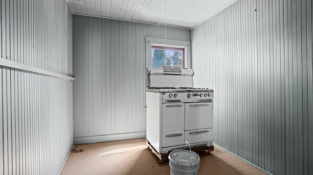 interior space with hardwood / wood-style flooring and double oven range