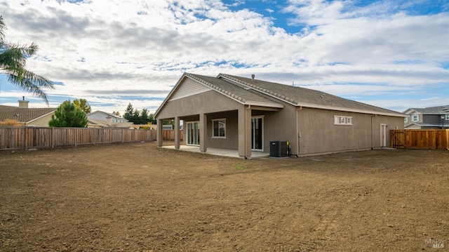 back of property with cooling unit