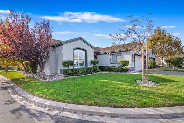 single story home featuring a front yard and a garage