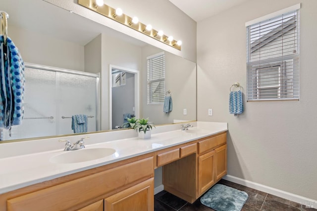 bathroom featuring vanity and walk in shower