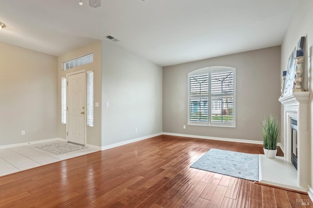 entryway with light hardwood / wood-style flooring