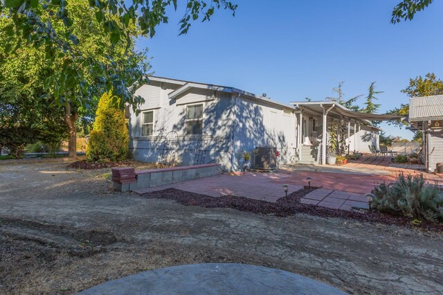 view of front of home featuring a patio