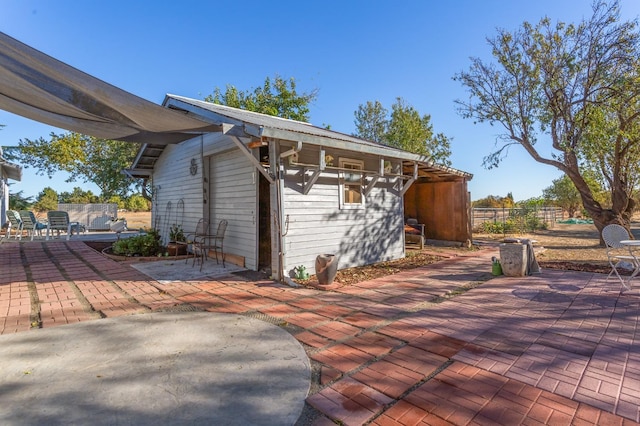 view of home's exterior featuring a patio