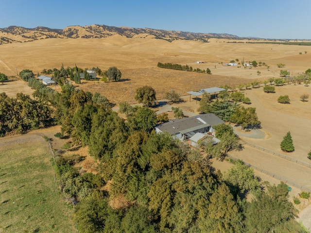 aerial view featuring a rural view and a mountain view