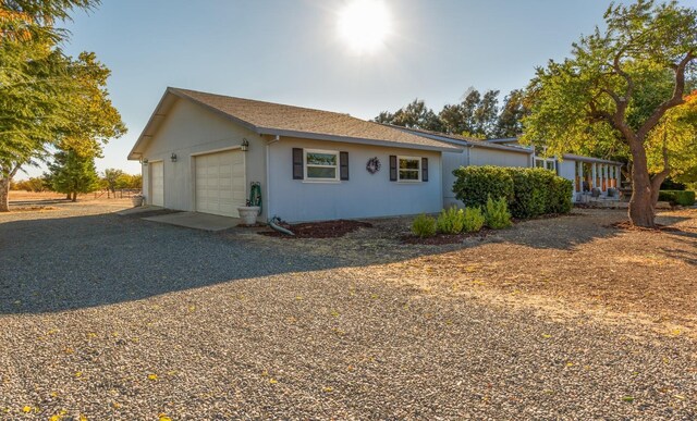 view of home's exterior with a garage