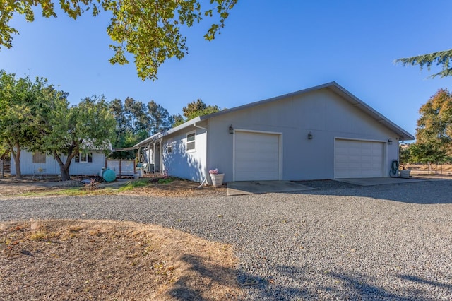 view of property exterior with a garage