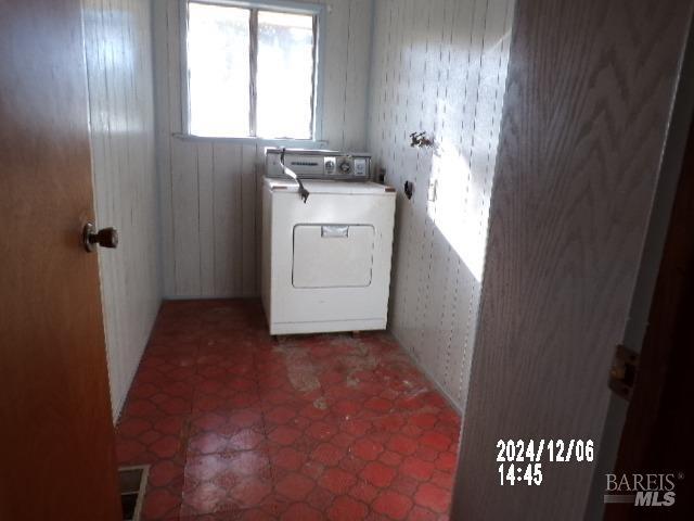 washroom featuring washer / dryer