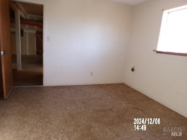 spare room with carpet flooring