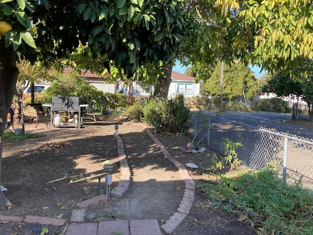 view of yard with fence