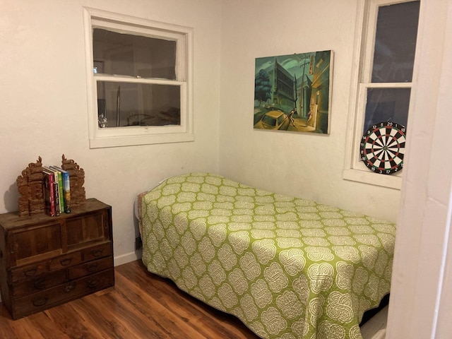 bedroom featuring wood finished floors