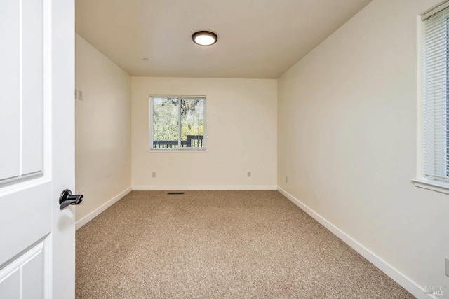 empty room featuring carpet