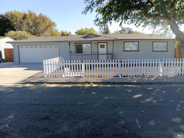 single story home featuring a garage