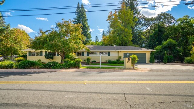 single story home with a garage