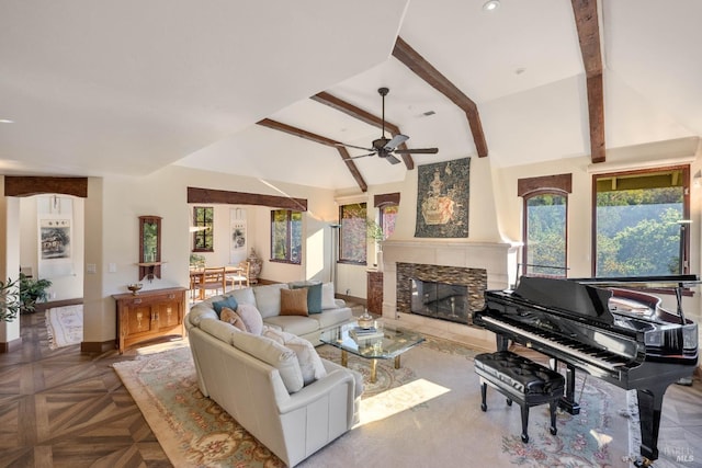 living room featuring parquet flooring, lofted ceiling with beams, a fireplace, and ceiling fan