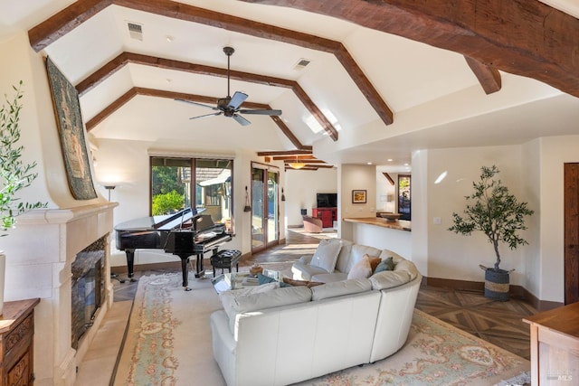 living room featuring light parquet floors, beamed ceiling, high vaulted ceiling, and ceiling fan