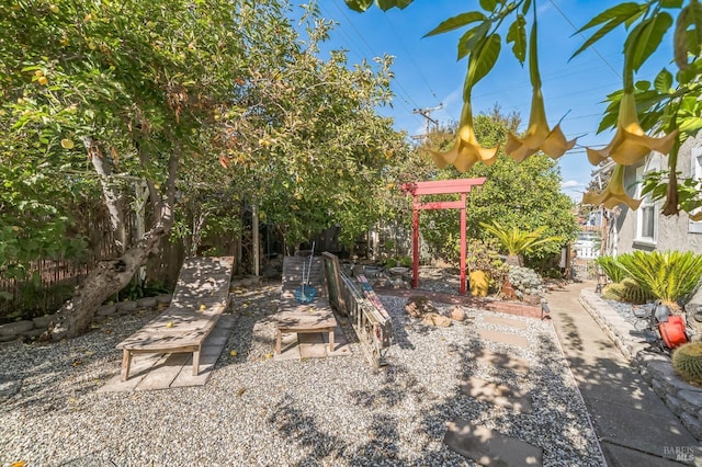 view of yard with a patio and fence