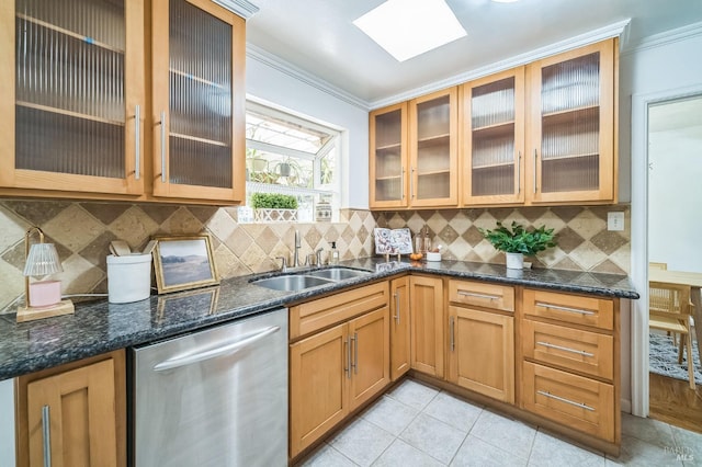 kitchen with dishwasher, a sink, glass insert cabinets, and crown molding