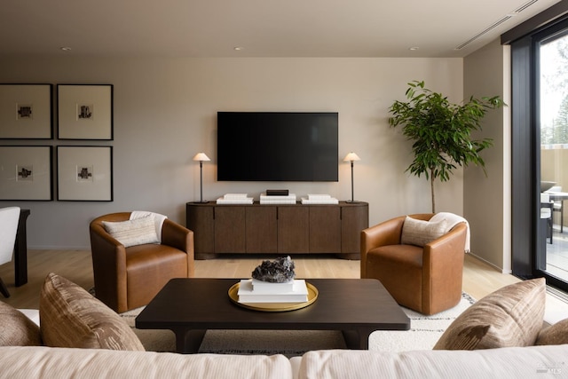 living room with light hardwood / wood-style floors