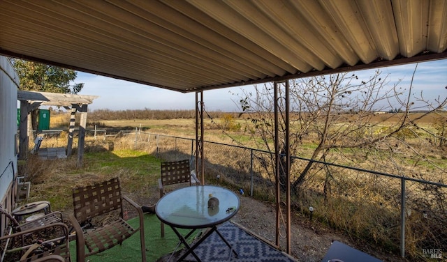 view of patio with a rural view