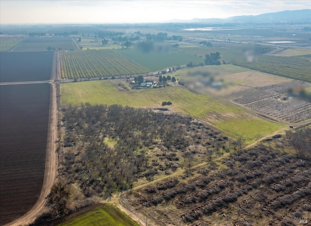 bird's eye view with a rural view and a water view