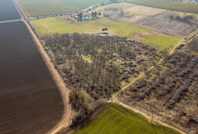 bird's eye view with a water view and a rural view